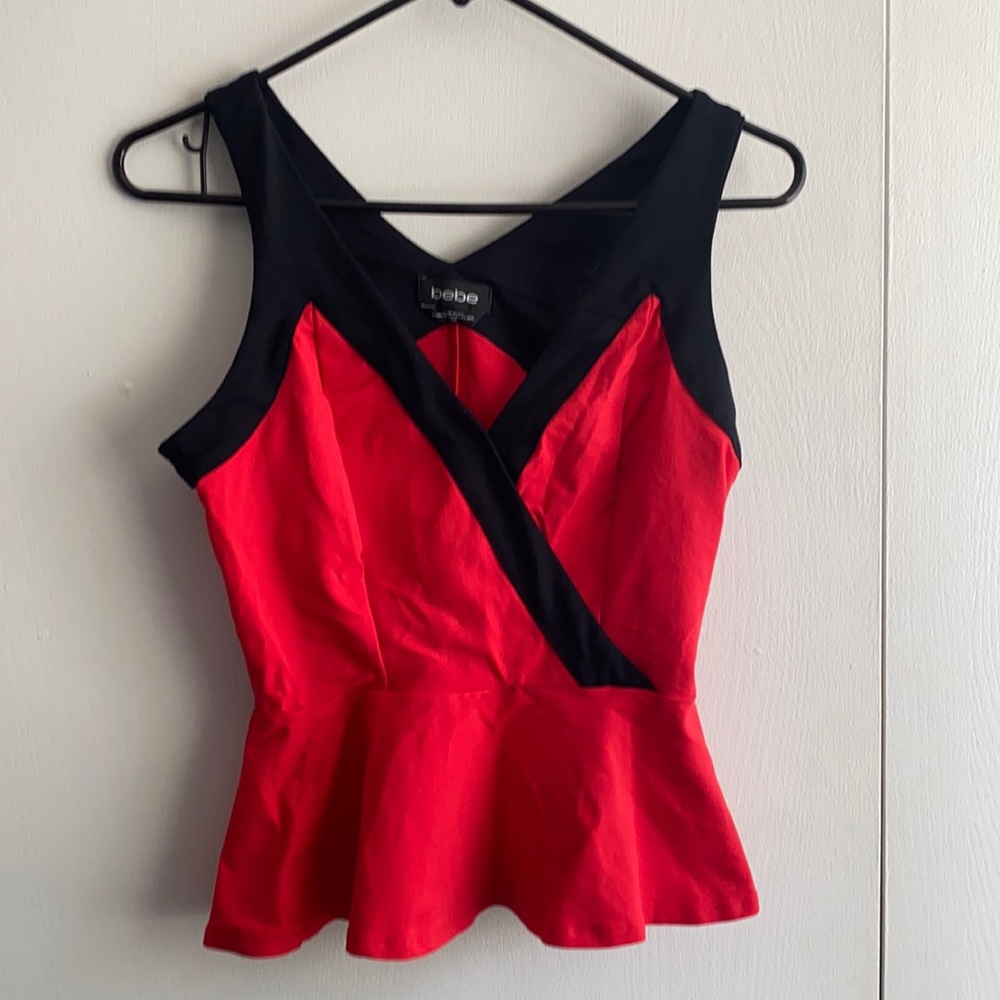 BEBE peplum blouse
